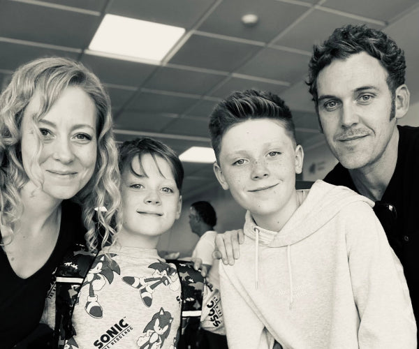 A family photograph of Rory, Sarah, Fynn & Oscar standing together